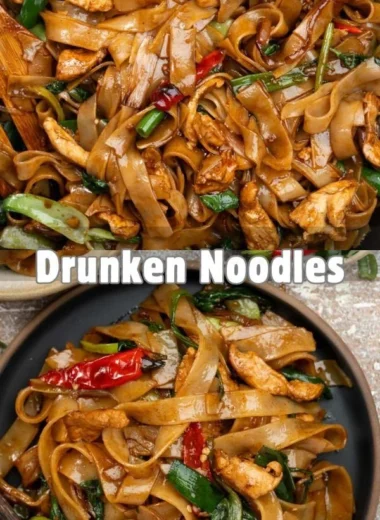 Plate of drunken noodles with vegetables and spices served in Thai cuisine.