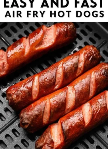 Deliciously cooked air fryer hot dogs served on a plate.