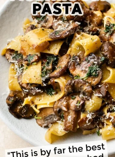 Delicious plate of Garlic Mushroom Pasta topped with fresh herbs
