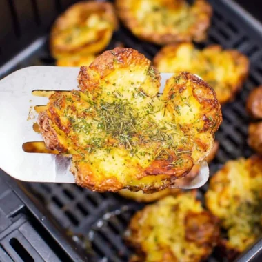 Crispy air fryer smashed potatoes seasoned and ready to serve