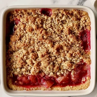 Classic rhubarb crumble bars with a crunchy topping and vibrant filling.