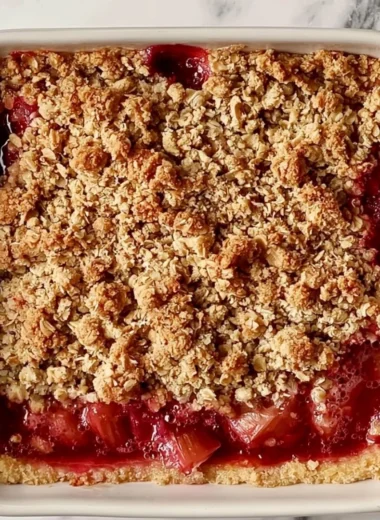 Classic rhubarb crumble bars with a crunchy topping and vibrant filling.