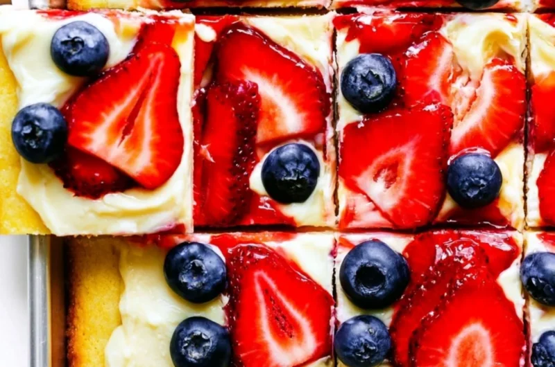 Delicious easy fruit pizza topped with fresh fruits and cream cheese frosting