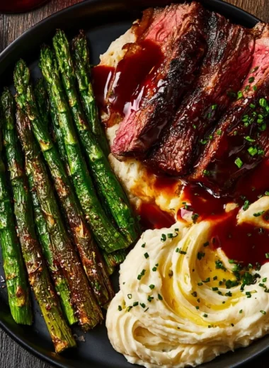 Delicious gourmet steak with mashed potatoes and asparagus on a plate