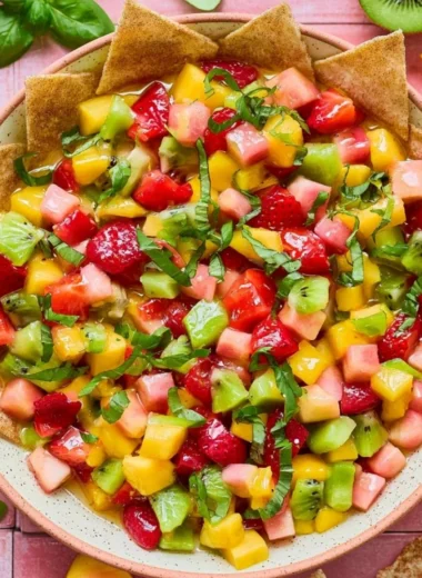 Fresh fruit salsa with cinnamon sugar chips served in a bowl
