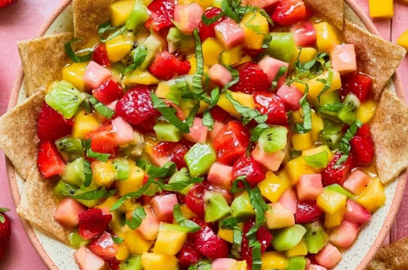 Fresh fruit salsa with cinnamon sugar chips served in a bowl