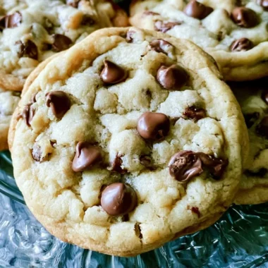 Soft Batch Chocolate Chip Cookies with melted chocolate chips fresh out of the oven