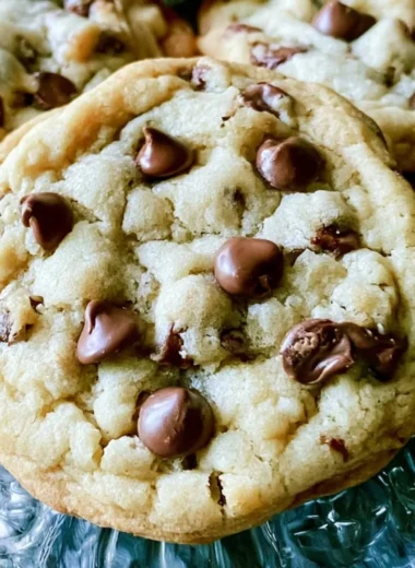 Soft Batch Chocolate Chip Cookies with melted chocolate chips fresh out of the oven