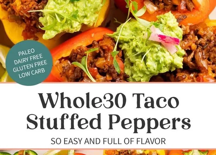 Whole30 taco stuffed peppers filled with seasoned meat and fresh veggies