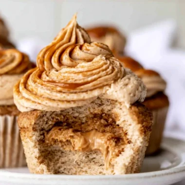 Cozy homemade dulce de leche cupcakes topped with caramel frosting