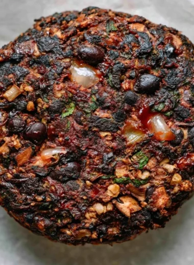 Deliciously prepared cozy mushroom veggie burgers served on a plate.