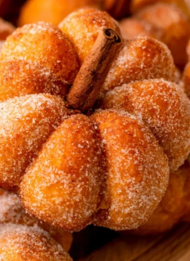 Freshly baked cozy pumpkin donuts with a delicious glaze