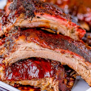 Deliciously tender smoked ribs ready for a weekend gathering.