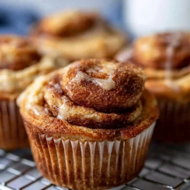 Freshly baked easy cinnamon protein muffins on a plate