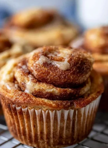 Freshly baked easy cinnamon protein muffins on a plate