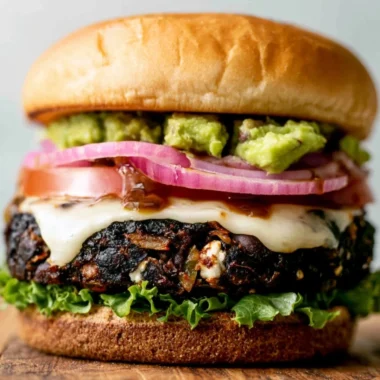 Plate of Ground Turkey Black Bean Burgers with fresh toppings