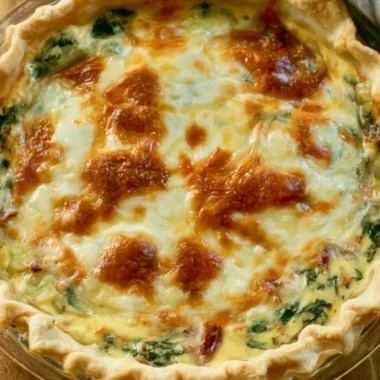 Cozy bacon spinach quiche with crispy bacon and fresh spinach