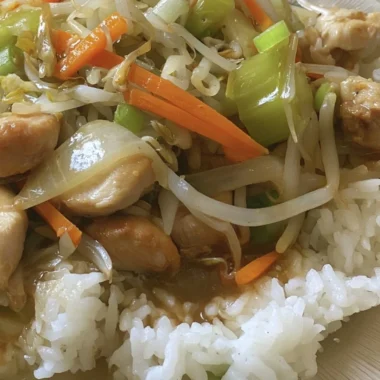 Delicious bowl of Cozy Cantonese Chicken Chow Mein with vegetables and chicken