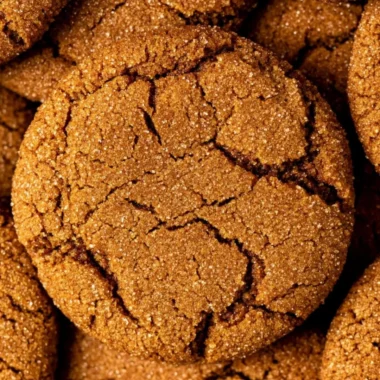 Deliciously baked cozy gingersnap cookies on a wooden table