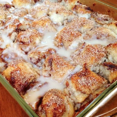 Delicious easy cinnamon roll casserole topped with icing