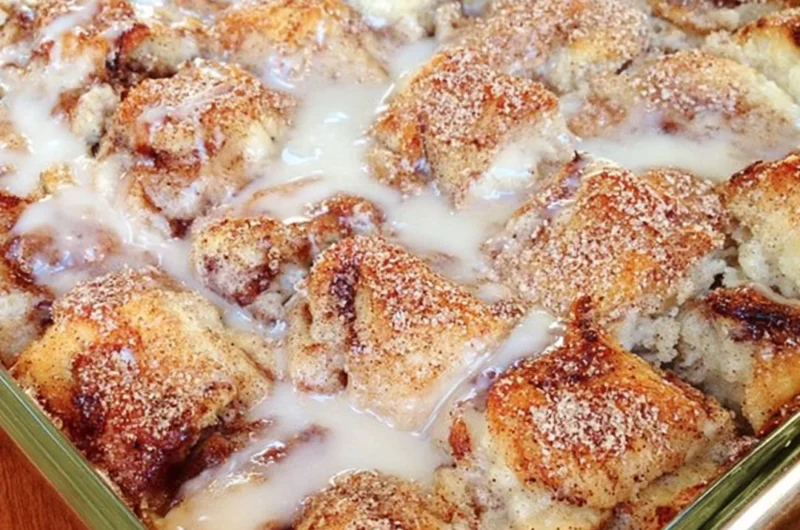 Delicious easy cinnamon roll casserole topped with icing
