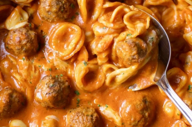 Delicious one pot meatball pasta served with fresh herbs